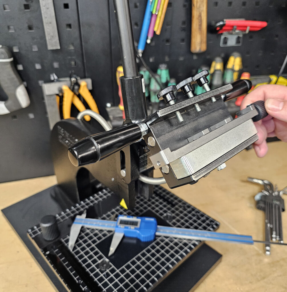 Close up of a mechanical element of a Metallic Elephant hot foil press