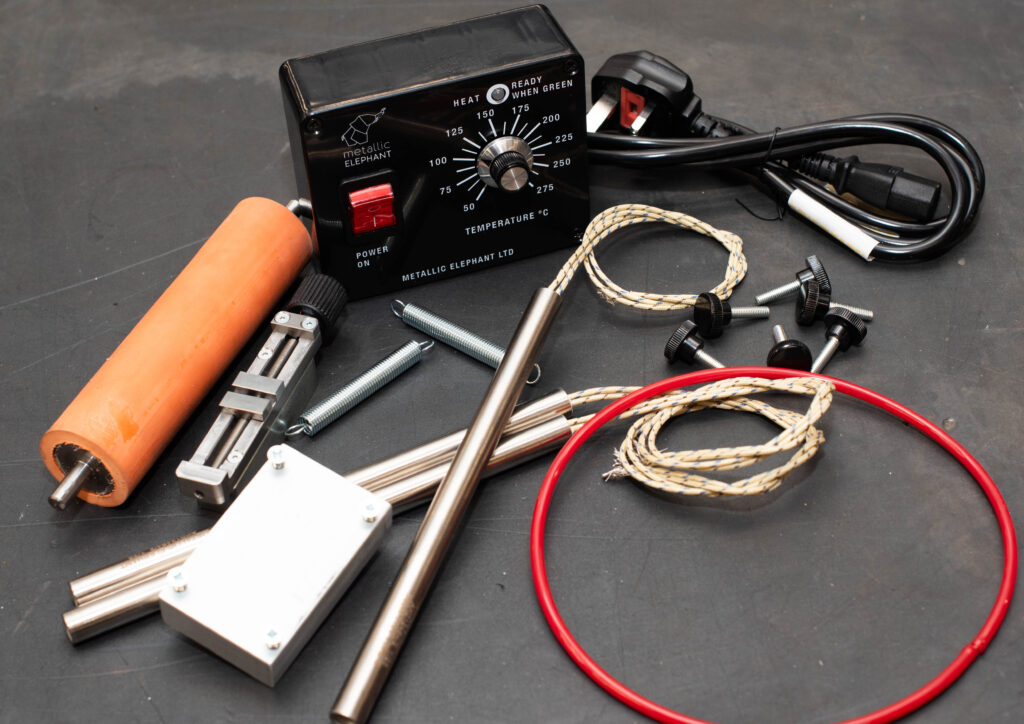 Close up of various hot foil press spare parts