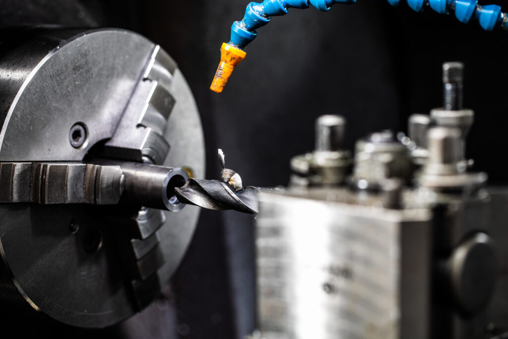 Close up of a drill bit within machinery