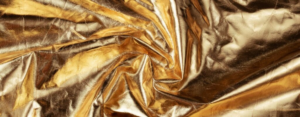 Hot foil is a traditional print process that uses a combination of heat, pressure, and a metal die to apply a thin layer of metallic foil to a substrate