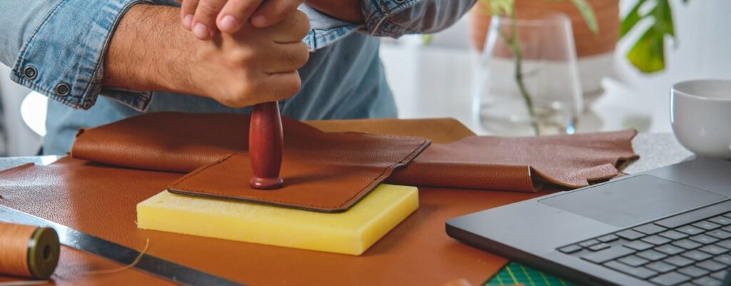 Leather foil stamping is a specialised hot foil process where metallic or pigmented foil is applied to a leather surface using heat & pressure