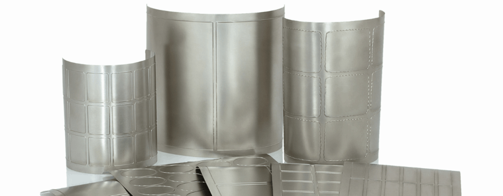 Photopolymer plates being crafted in a UK letterpress workshop by Metallic Elephant, showing precision printing setup and clean plate detail